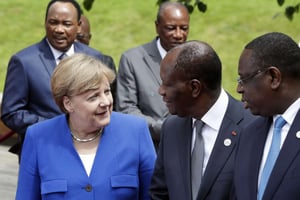 La chancelière allemande Angela Merkel avec le président ivoirien Alassane Ouattara lors du « Partenariat G20 Afrique, investir dans un avenir commun », à Berlin, le 12 juin 2017. © Michael Sohn/AP/SIPA