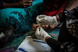 Un test de paludisme sur une patiente à Zanzibar, en Tanzanie, en 2006 (Archives). © Creative Commons / Flickr / USAID