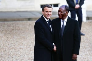 Avec le président ivoirien, Alassane Ouattara, au palais de l’Élysée, en avril. © HAMILTON/REA