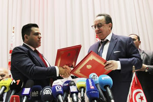 Hafedh Caïd Essebsi (droite) avec Slim Riahi, dont le parti, l’UPL, avait été absorbé par Nidaa Tounes. © Hichem