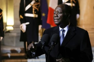 Le président ivoirien Alassane Ouattara au sortir du Palais de l’Elysée à Paris après un entretien avec le président Emmanuel Macron, le 15 février 2019. © LUDOVIC MARIN/AFP