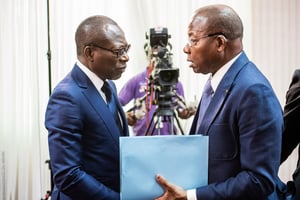 Le président béninois Patrice Talon et le président de l’Assemblée nationale (à droite) Adrien Houngbédji, le 6 mars. © RODRIGUE AKO/Présidence du Bénin