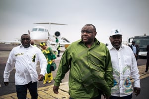 À son arrivée 
à l’aéroport de Kinshasa, le 23 juin. © ALEXIS HUGUET/AFP