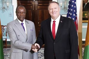 Le chef de l’État guinéen 
et le secrétaire d’État Mike Pompeo, à Washington, le 13 septembre. © US State Department