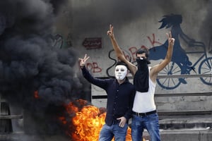 Des manifestants à Beyrouth, le 29 septembre 2019, pour protester contre la crise économique au Liban. © Bilal Hussein/AP/SIPA