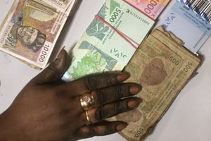 Des billets de francs CFA © AP/Sipa