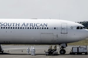 Un appareil de South African Airways sur le tarmac de Polokane (Afrique du Sud), le 14 mars 2020. © GUILLEM SARTORIO / AFP