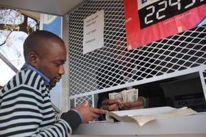 Kiosque Eco Cash, plateforme de mobile banking d’Econet Wireless au  Zimbabwe. © Tsvangirayi Mukwazhi pour TAR