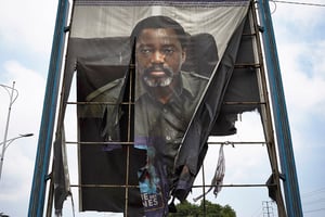 Un portrait de Joseph Kabila brûlé par des partisans de Félix Tshisekedi, le 10 janvier 2019 à Kinshasa. © HUGH KINSELLA CUNNINGHAM/EPA/MAXPPP