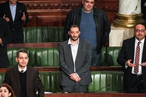Le député tunisien Yassine Ayari (au centre), le 15 février 2018 au Parlement, à Tunis. © FETHI BELAID/AFP