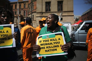 Une militante de l’ANC lors d’une manifestation en 2014 à Pretoria. © REUTERS/Mike Hutchings