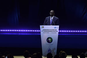 Le président sénégalais Macky Sall lors de son discours d’ouverture du 9e Forum mondial de l’eau, à Dakar, le 21 mars 2022. © Photo by SEYLLOU / AFP.