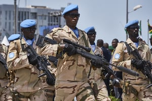 Des soldats de la Minusma défilent à Bamako lors du 58e anniversaire de l’indépendance du Mali, le 22 septembre 2018. © MICHELE CATTANI/AFP