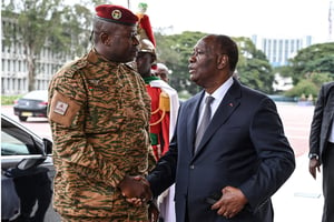 Paul-Henri Sandaogo Damiba et Alassane Ouattara, le 5 septembre. © SIA KAMBOU/AFP