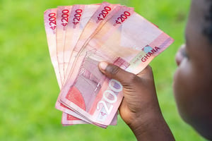 Le cédi ghanéen s’est vu attribuer le « titre » de monnaie la moins performante du continent en 2022. © Adobe Stock
