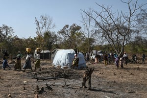 Des réfugiés burkinabés dans un centre d’accueil à Tougbo le 22 janvier 2022. © Sia KAMBOU / AFP