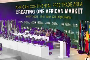 Lors de la 10e session extraordinaire de la Conférence de l’Union africaine, qui a entériné la création de la Zlecaf, à Kigali, au Rwanda, le 21 mars 2018. © Montage JA ; Gabriel Dusabe//CHINE NOUVELLE/SIPA