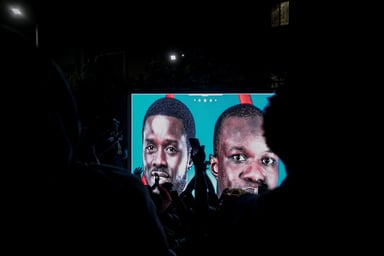 People celebrating the liberation of Ousmane Sonko and Diomaye Faye in front of Sonko's house. Dakar, Senegal.