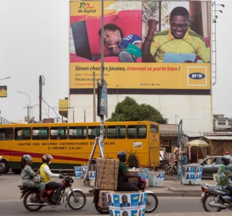 Une affiche de l'opérateur de téléphonie mobile MTN à Cotonou, au Bénin &copy; Gwenn Dubourthoumieu pour Jeune Afrique