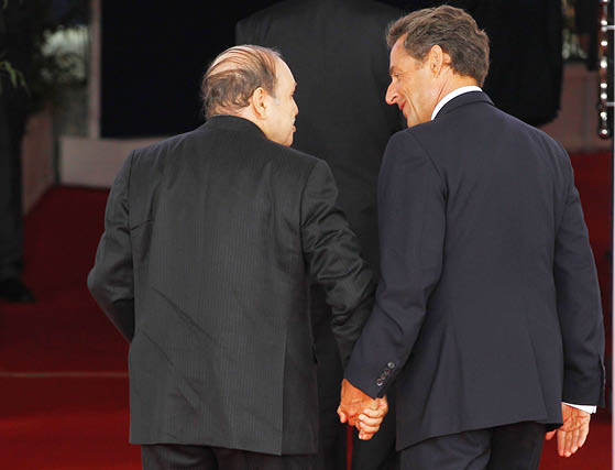 Avec Nicolas Sarkozy, le 27 mai 2011, à Deauville, lors du sommet du G8. &copy; Yann Langsdon/EPA/CORBIS