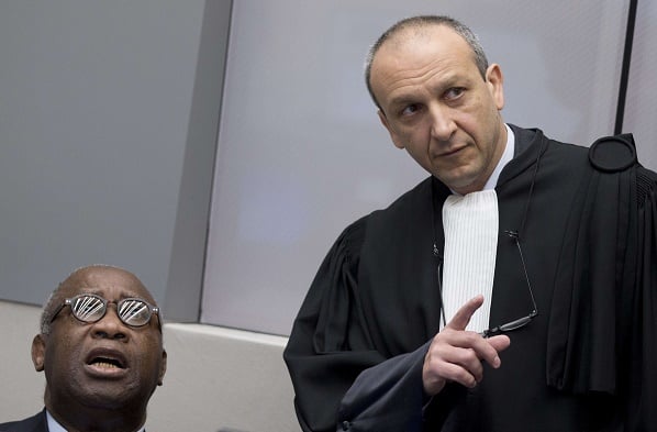 Laurent Gbagbo et son avocat Emmanuel Altit lors de l'ouverture du procès le 28 janvier 2015. &copy; Peter Dejong/AP/SIPA