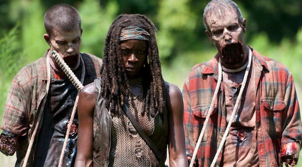 Michonne-and-her-walkers © Walkers and Michonne (Danai Gurira) – The Walking Dead _ Season 4, Episode 9 – Photo Credit: Gene Page/AMC